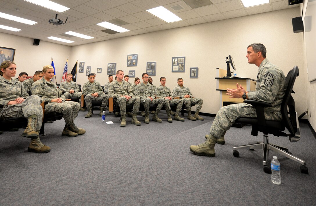 Chief Master Sgt. Richard Parsons, Air Combat Command command chief, meets with Airmen in the Airman Leadership School at Ellsworth Air Force Base, S.D. Jan. 29, 2014. During his visit, Parsons toured several locations - including the Raider Café dining facility, 28th Security Forces Squadron shoot house, and the 432nd Attack Squadron - to speak with Airmen and discuss the roles they play in Ellsworth's mission. (U.S. Air Force photo by Airman 1st Class, Rebecca Imwalle/Released)
