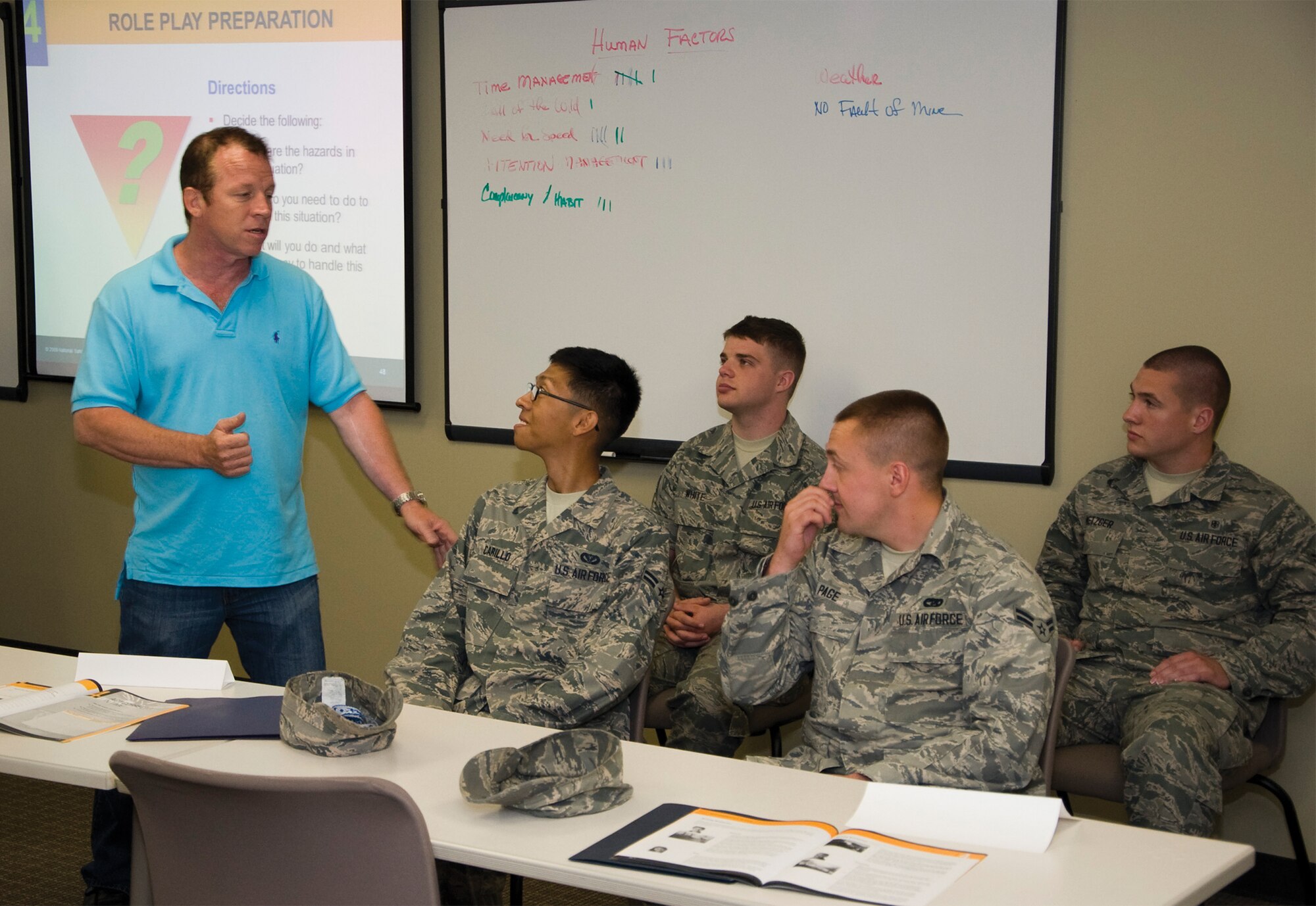 Tim Hahn, 436th AW Safety Office occupational safety and health specialist, explains the roles Airmen will be acting out in a scenario during the “Alive at 25” defensive driving course at Dover AFB, Del. Alive at 25 was initially brought to Dover AFB in 2007 to help combat the high amount of Airmen involved in alcohol-related driving offenses and has helped reduce the number of offenses by 33 percent over the past five years.