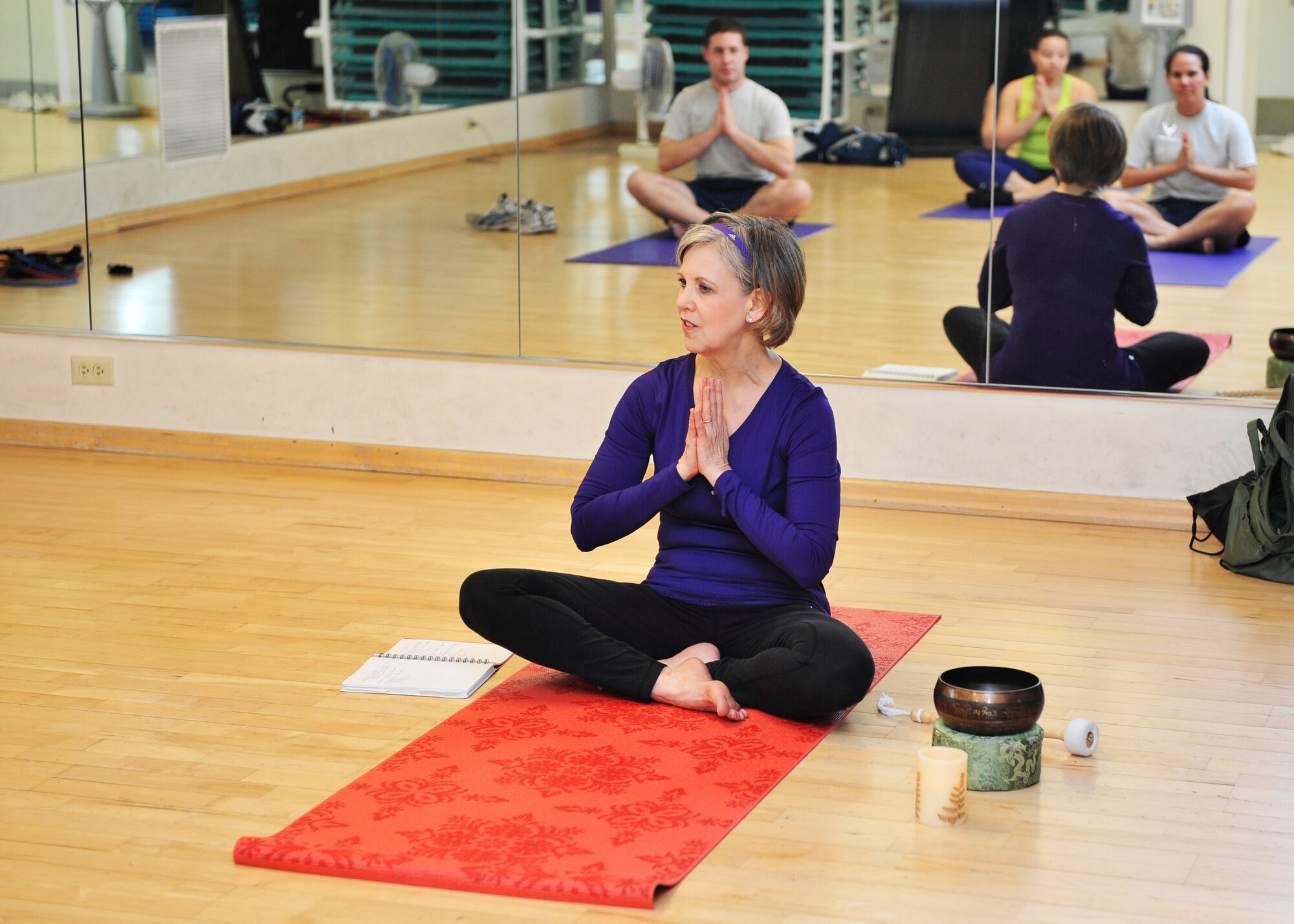 Chaplain (Lt. Col.) Christine Blice-Baum teaches a yoga class Jan. 29 for Biomedical Science Corps week. The yoga class was a part of a week of events for the 2nd annual BSC week Jan 27-31. (U.S. Air Force photo/Airman 1st Class Kiana Brothers)