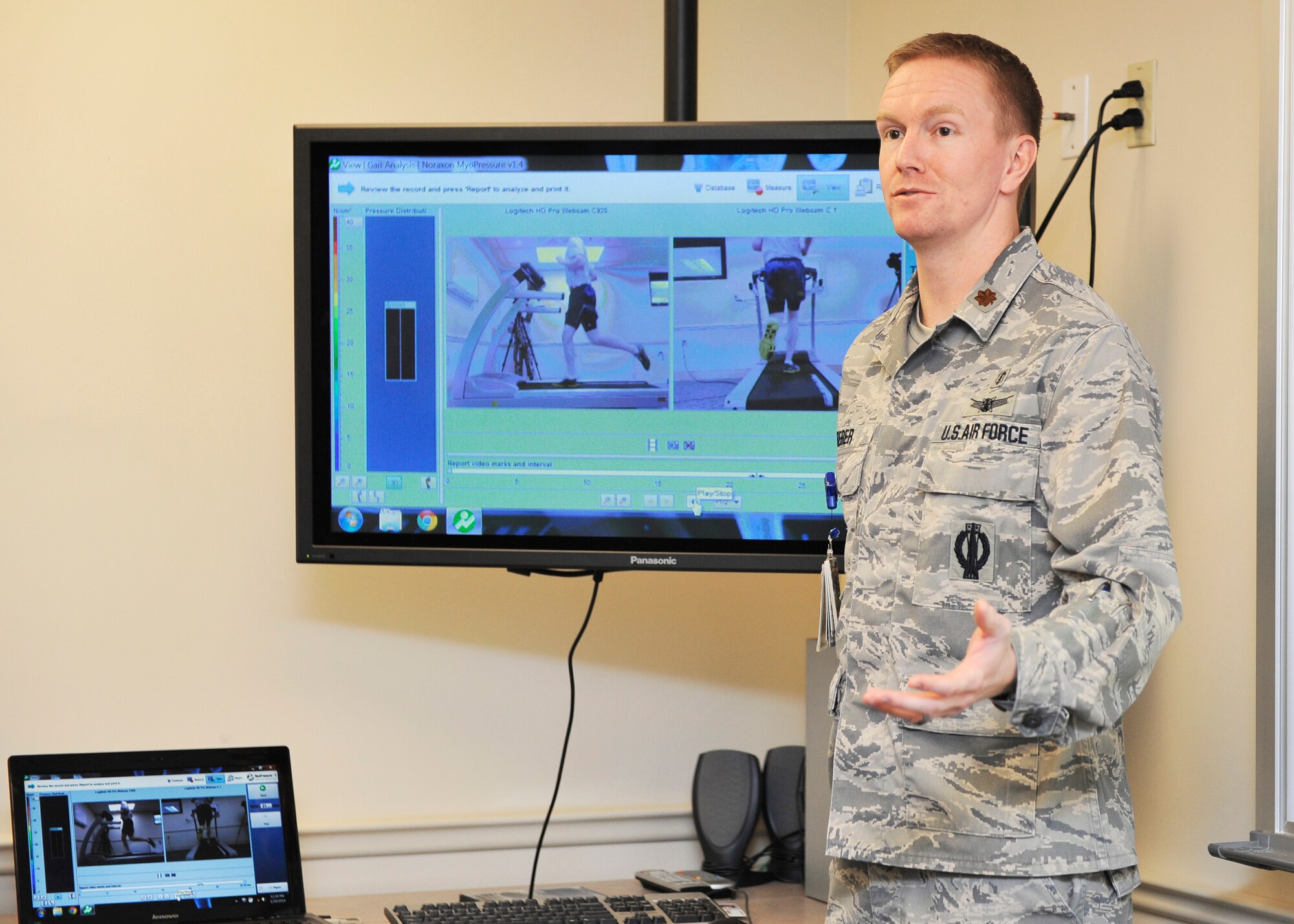 Maj. Rett Reber explains the techniques the physical therapy clinic use for patients Jan. 29 during a tour. As part of daily events for the Biomedical Sciences Corps week to showcase the medical career fields. (U.S. Air Force photo/Airman 1st Class Kiana Brothers)