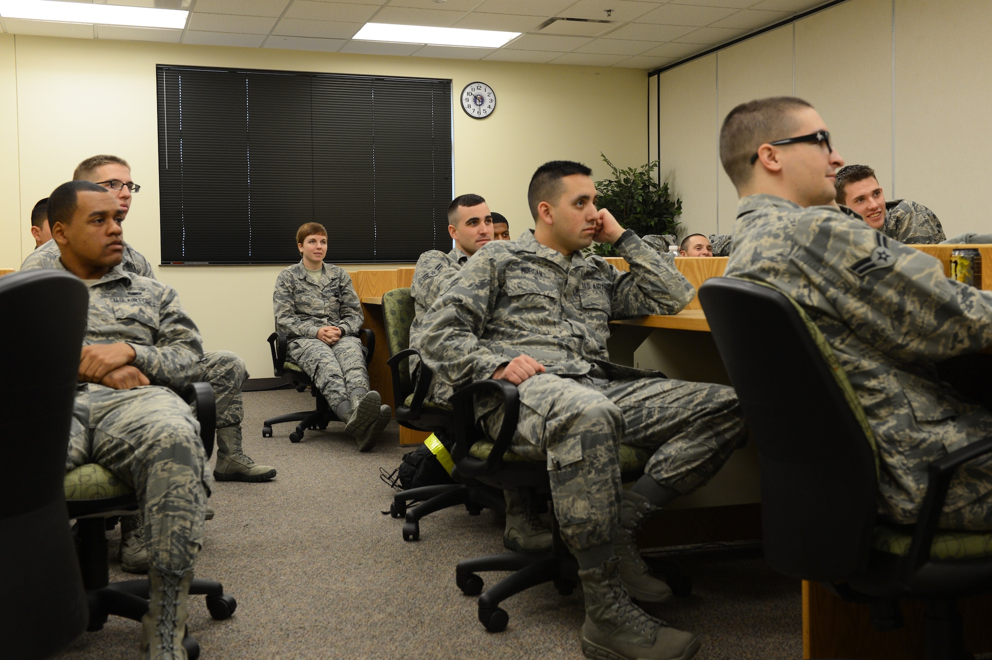 U.S. Air Force Airmen listen to a briefing during the First Term Airman’s Course at Shaw Air Force Base, S.C., Jan. 28, 2014. All first-term Airmen must participate in the three-and-a-half day course to introduce them to the atmosphere of the base as well as the organizations the base has to offer. (U.S. Air Force photo by Airman 1st Class Diana M. Cossaboom/Released)