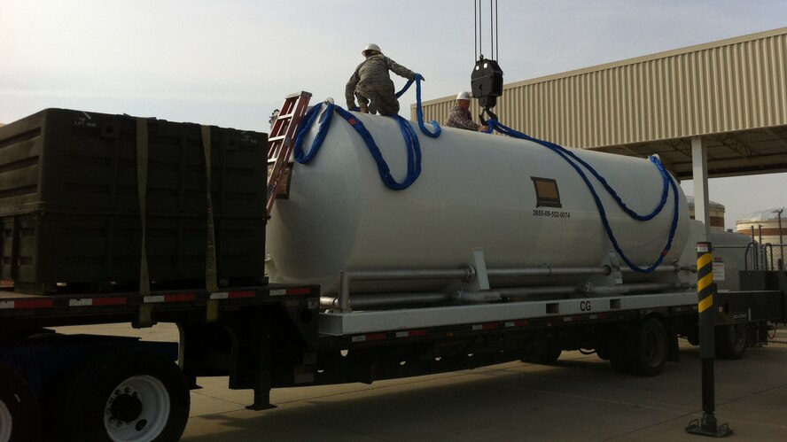 2nd CES pavements and equipment Airmen replace liquid oxygen tanks on Barksdale Air Force Base. Liquid oxygen tanks have a life expectancy and eventually need replacing. (U.S. Air Force/Courtesy Photo)
