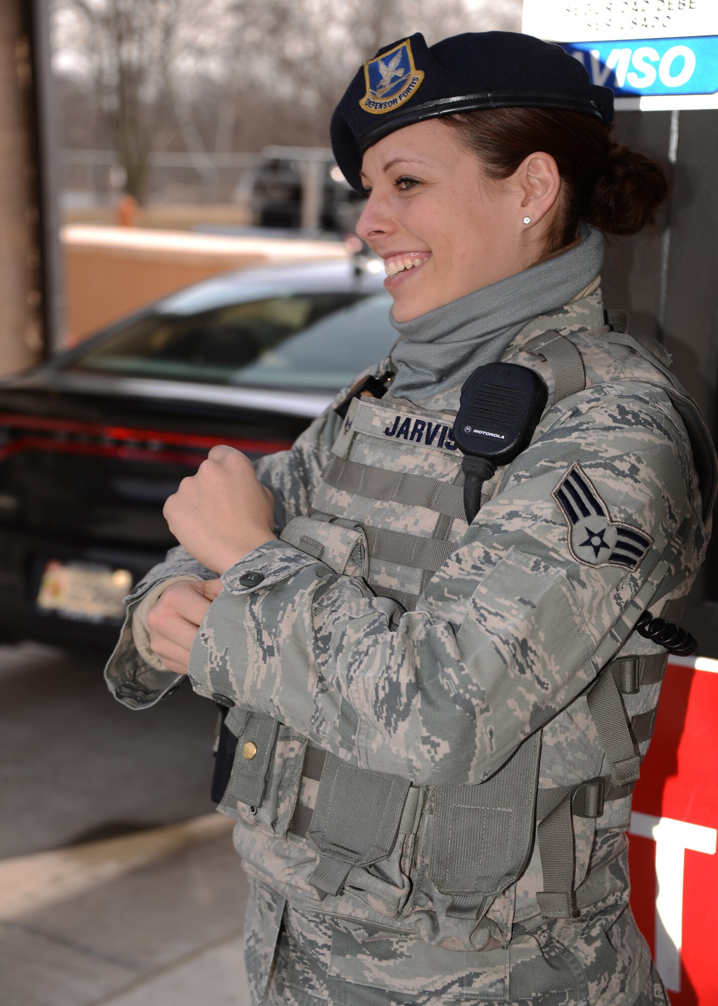 Senior Airman Miriam Jarvis, 175th Security Forces Squadron, stands at the front gate of Warfield Air National Guard base, Baltimore, Md. on February 4, 2014.  Senior Airman Jarvis has been working with the 175th Security Forces Squadron since August 13, 2008.  (Air National Guard photo by Senior Master Sgt. Edward Bard/RELEASED)