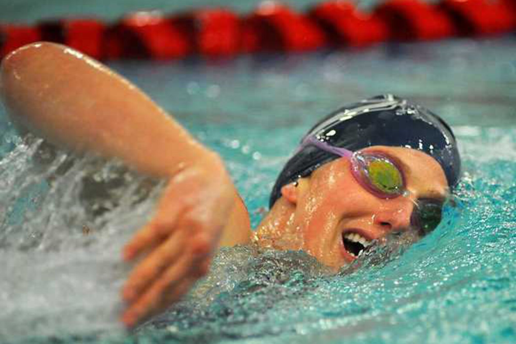 62nd Airlift Wings’s Katherine Shroyer finished first in four events during the recent 2014 JBLM Swimming Championships, just eight weeks after having a baby. (Photo by Scott Hansen/Northwest Guardian)