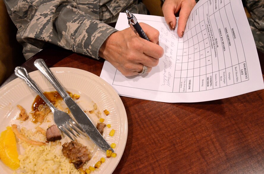 A judge critiques a dish during the first taste test for the Air Force Reserve Command Top Chef Competition Oct. 28. (U.S. Air Force photo/Brad Fallin)