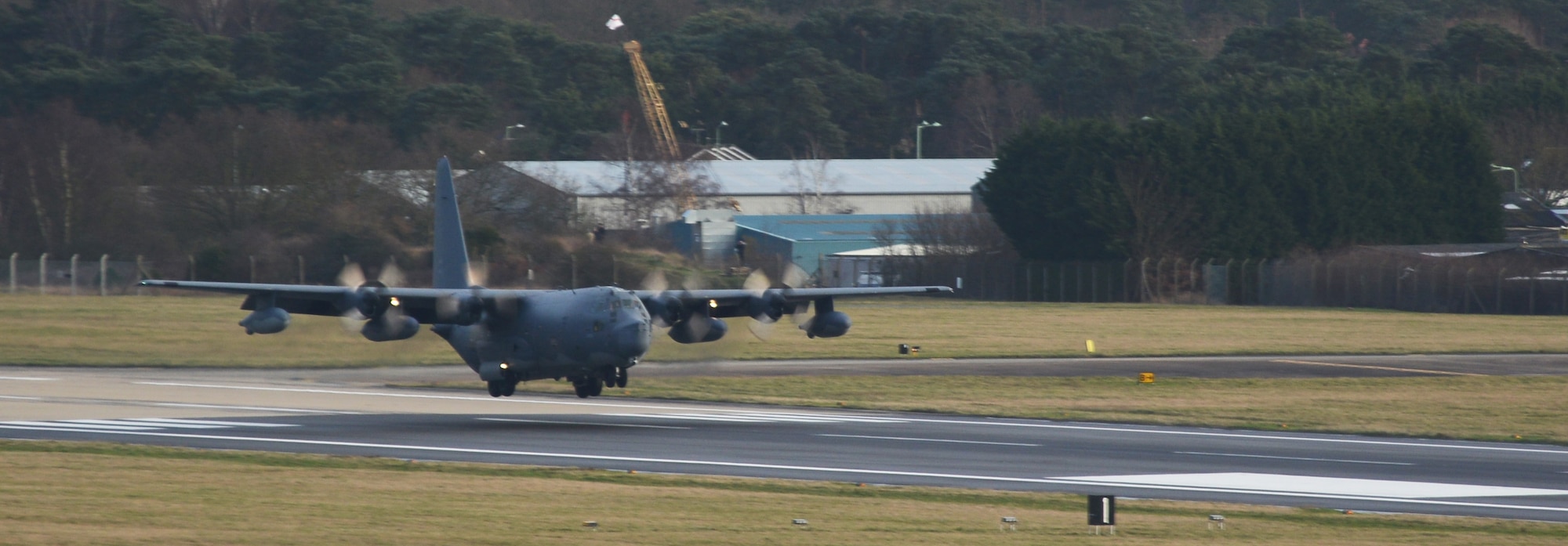 A 67th Special Operations Squadron MC-130P Combat Shadow comes in for its last landing in the U.K. Jan. 24, 2014, on RAF Mildenhall, England. Since the mid-1980s, the MC-130P has participated in special operations missions ranging from air refueling of the military’s vertical lift platforms; precision airdrop of personnel and equipment; and the execution of night, long-range, transportation and resupply of military forces across the globe. Its departure marks the final step of Special Operations Command Europe's transition from the Combat Shadow to the MC-130J Commando II. (U.S. Air Force photo by Airman 1st Class Dillon Johnston/Released)