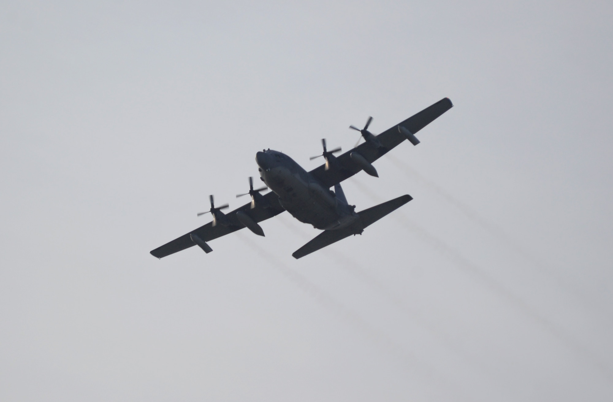 A 67th Special Operations Squadron MC-130P Combat Shadow takes its final flight in the U.K. Jan. 24, 2014, over RAF Mildenhall, England. Since the mid-1980s, the MC-130P has participated in special operations missions ranging from air refueling of the military’s vertical lift platforms; precision airdrop of personnel and equipment; and the execution of night, long-range, transportation and resupply of military forces across the globe. Its departure marks the final step of Special Operations Command Europe's transition from the Combat Shadow to the MC-130J Commando II. (U.S. Air Force photo by Airman 1st Class Dillon Johnston/Released)