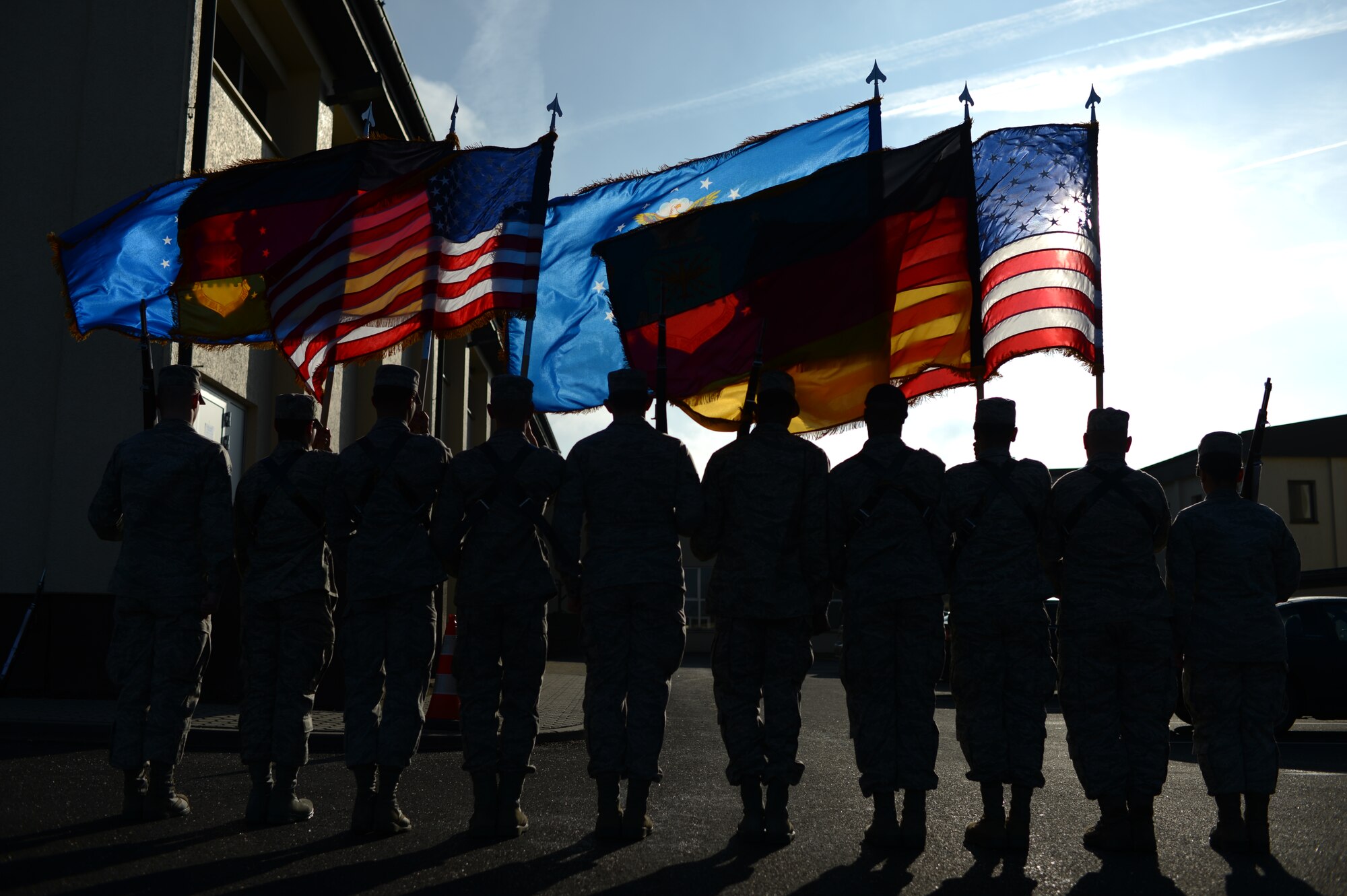 Two flag details, consisting of honor guard members in training, march during a training week, at Spangdahlem Air Base Jan. 29, 2014. The training week was the first iteration of the honor guard's new rigorous training program. (U.S. Air Force photo by Senior Airman Gustavo Castillo/Released)