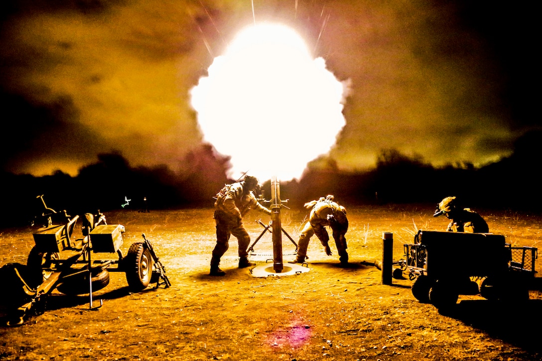 Army Rangers fire a 120mm mortar during a tactical training exercise on Camp Roberts, Calif., Jan. 30, 2014. The Rangers are assigned to Company B, 2nd Battalion, 75th Ranger Regiment. Live-fire training enables Rangers to maintain proficiency with their tactical skills.