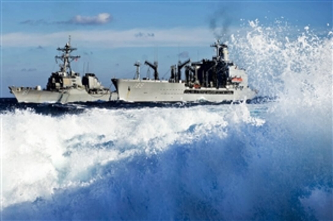 The guided-missile destroyer USS Ramage, left, receives supplies from the Military Sealift Command fleet replenishment oiler USNS John Lenthall during a replenishment in the Mediterranean Sea, Feb. 1, 2014. The Ramage is supporting maritime security operations and theater security cooperation efforts in the U.S. 6th Fleet area of responsibility. 