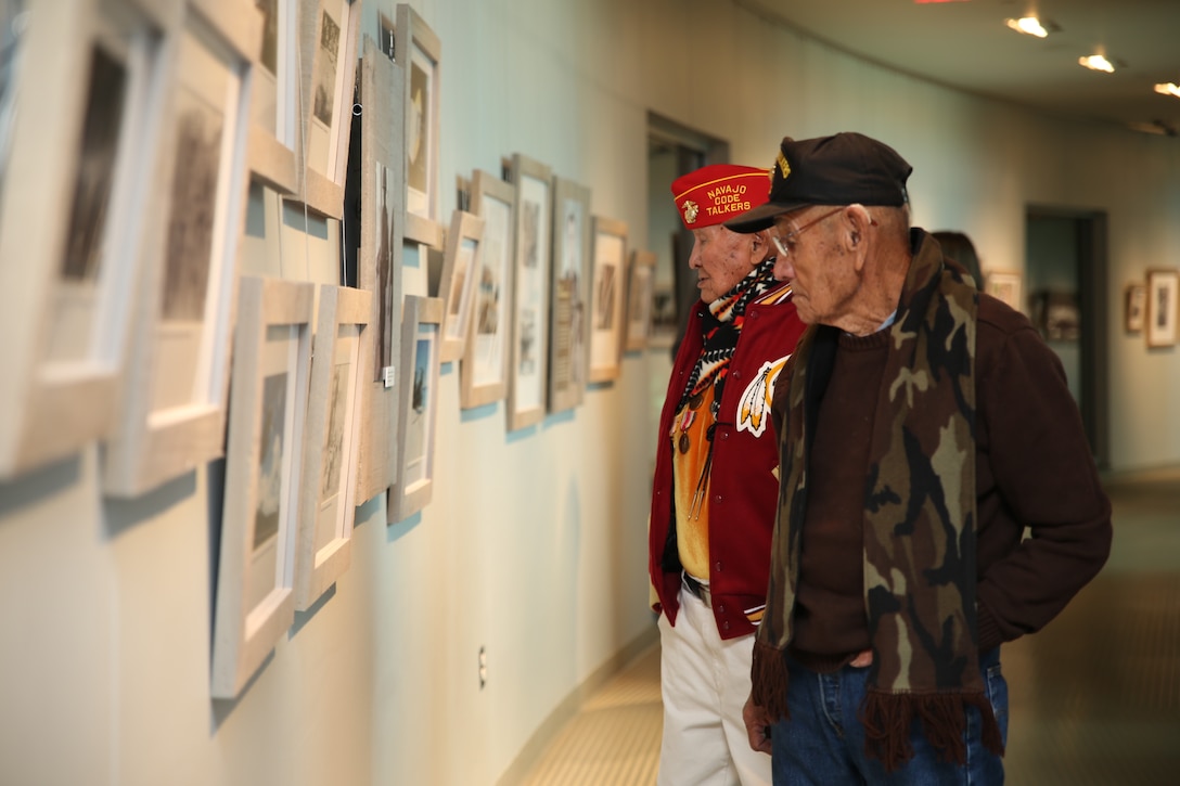 George James Sr. and George Boyd Willie Sr., Navajo code talkers from World War II, walk through the National Museum of the Marine Corps on Nov. 25, 2013. James and Willie are two of nearly 35 code talkers that are still living.