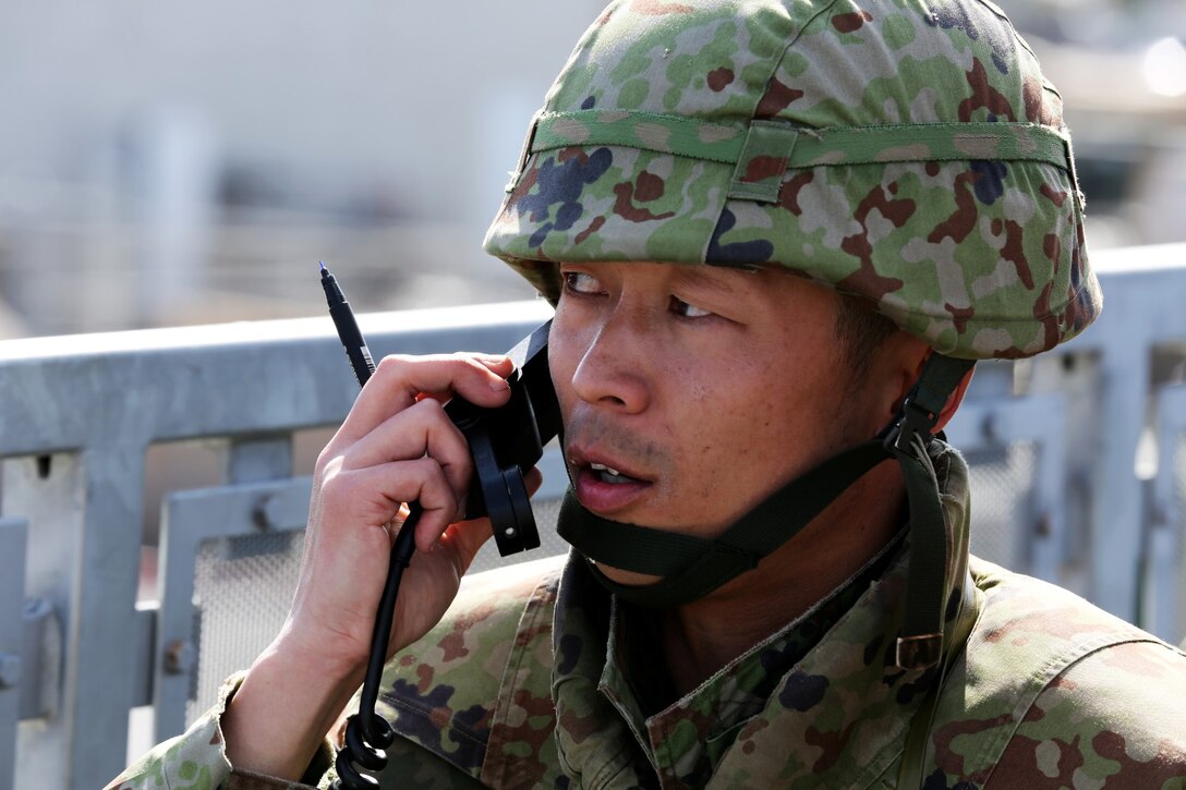U.S. Marine (rank) (FNamee LName), (unit), (photo description) during Exercise Iron Fist 2014 aboard (Location: Camp Pendleton, Calif.), (Date: Jan. 23, 2014). Iron Fist 2014 is an amphibious exercise that brings together Marines and sailors from the 15th Marine Expeditionary Unit, other I Marine Expeditionary Force units, and soldiers from the Japan Ground Self-Defense Force, to promote military interoperability and hone individual and small-unit skills through challenging, complex and realistic training. ( U.S. Marine Corps photo by Lance Cpl. Anna K. Albrecht/Released)
