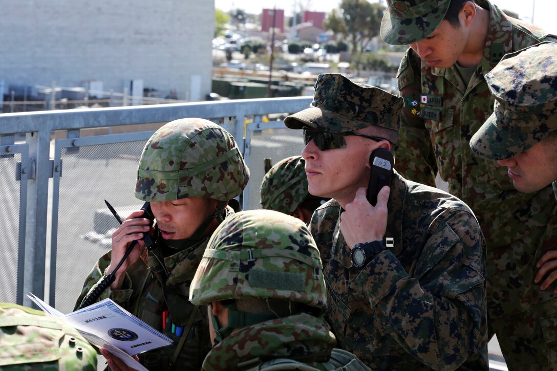 U.S. Marine (rank) (FNamee LName), (unit), (photo description) during Exercise Iron Fist 2014 aboard (Location: Camp Pendleton, Calif.), (Date: Jan. 23, 2014). Iron Fist 2014 is an amphibious exercise that brings together Marines and sailors from the 15th Marine Expeditionary Unit, other I Marine Expeditionary Force units, and soldiers from the Japan Ground Self-Defense Force, to promote military interoperability and hone individual and small-unit skills through challenging, complex and realistic training. ( U.S. Marine Corps photo by Lance Cpl. Anna K. Albrecht/Released)

