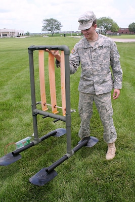 Cadet Daniel Brownfield works on a prototype Flutter Mallard in an experimental “B-Hut” setting at the ERDC Forward Operating Base Laboratory in Champaign, Ill.