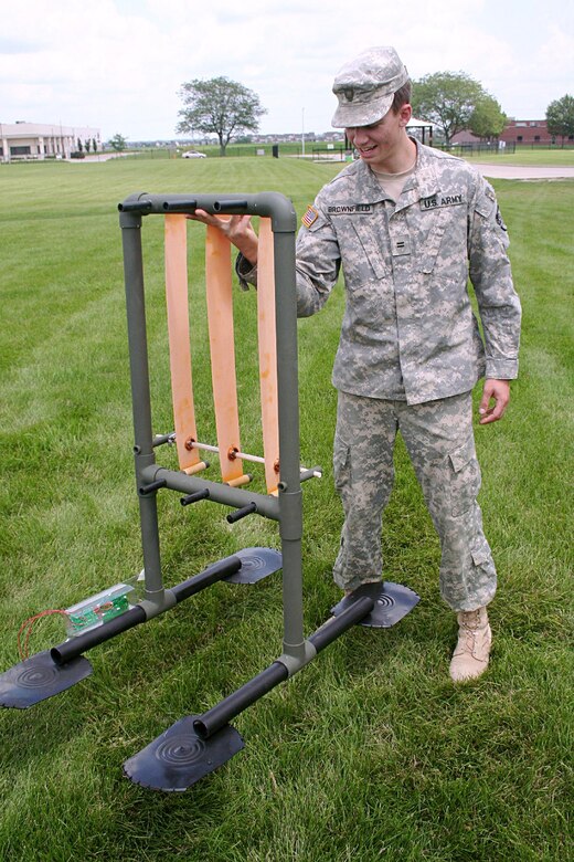 Cadet Daniel Brownfield works on a prototype Flutter Mallard in an experimental “B-Hut” setting at the ERDC Forward Operating Base Laboratory in Champaign, Ill.