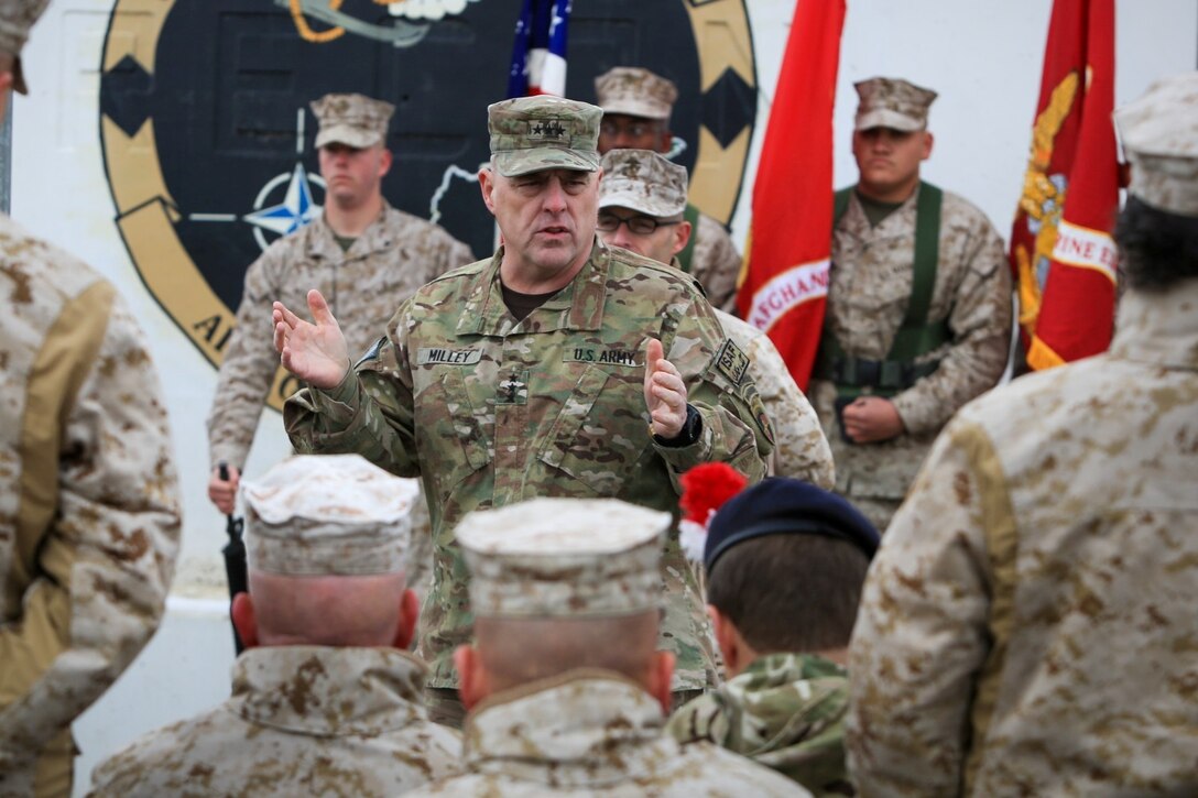 U.S. Army Soldier Lt. Gen. Mark A. Milley, Commander of ISAF Forces, gives a speech to U.S. Marines, Sailors, Soldiers, and ISAF military personel during a Transfer of Authority ceremony from the II Marine Expeditionary Force (II MEF) Forward to Marine Expeditionary Brigade Afghanistan (MEB-A) on Camp Leatherneck, Helmand province, Afghanistan, Feb. 5, 2014. MEB-A officially relieved II MEF (FWD) and took over their responsibilities for Regional Command (Southwest). (Official Marine Corps Photo by Lance Cpl. Darien J. Bjorndal/Released)