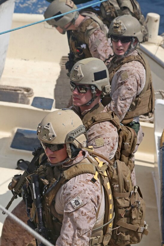 GULF OF ADEN (Feb. 1, 2014) - U.S. Marines assigned to Reconnaissance Platoon, Battalion Landing Team 1/4, 13th Marine Expeditionary Unit (MEU) conduct visit, board, search and seizure (VBSS) training in the Gulf of Aden, Feb. 1, 2014. The 13th MEU is deployed with the Boxer Amphibious Ready Group as a theater reserve and crisis response force throughout the U.S. 5th Fleet area of responsibility. (U.S. Marine Corps photo by Lance Cpl. Lonzo-Grei D. Thornton, 13th Marine Expeditionary Unit Combat Camera/Released)

 
