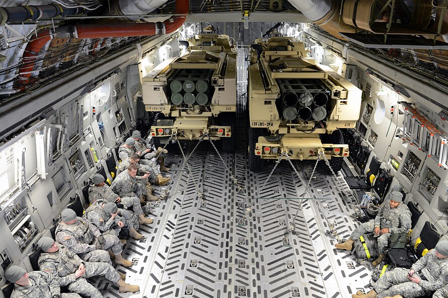 Soldiers from the 17th Fires Brigade stationed at Joint Base Lewis-McChord, Wash., wait to arrive at Schoonover, Calif., Feb. 1, 2014. Airmen from the 62nd Airlift Wing, 446th Airlift Wing and various other units from JBLM participated in the week-long HI-RAIN exercise. (U.S. Air Force photo/ Airman 1st Class Jacob Jimenez)  