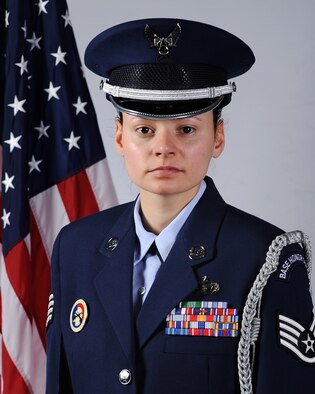 Staff Sgt. Ashley Correa has been recognized as the Air Reserve Personnel Center Honor Guard Member of the Year. Brig. Gen. Samuel Mahaney, ARPC commander, honored ARPC’s 2013 outstanding performers of the year as well as their A1 annual award winners at the Summit Conference and Event Center Feb. 6, 2014, in Denver. (U.S. Air Force courtesy photo)