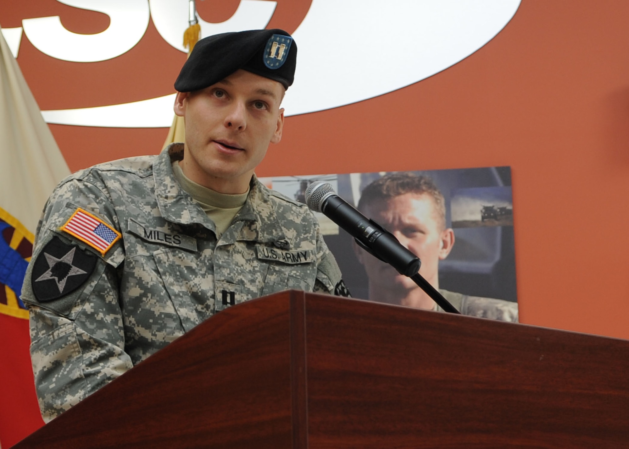 U.S. Army Capt. Richard Miles, 235th Signal Company, Special Troops Battalion, 7th Transportation Brigade (Expeditionary) commander, speaks during an inactivation ceremony at Fort Eustis, Va., Jan. 31, 2014. While some of the 235th Sig. Co. Soldiers and families will be assigned to various units around the world, many will stay at Fort Eustis. (U.S. Air Force photo by Airman 1st Class Austin Harvill/Released)
