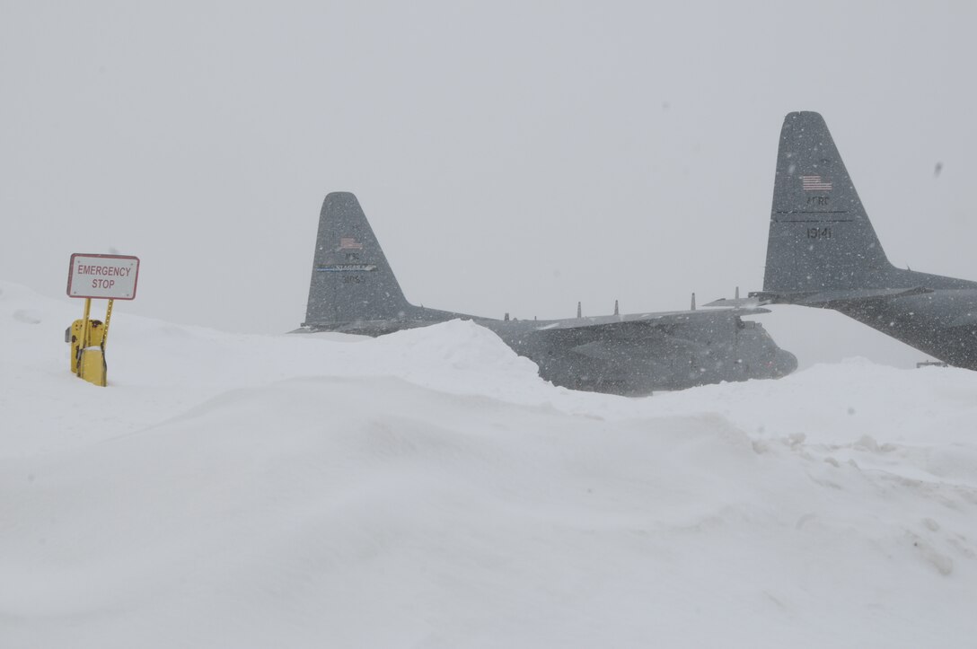 Judging by the weather conditions, the only reason why anyone would want to come here is for an emergency stop only as the sign reads on February 6, 2014. These 914th Airlift Wing C-130 aircraft are stationed here at the Niagara Falls Air Reserve Station, New York. For much of the Northeast section of the US it has been a bitterly cold winter, but the Air Force mission continues despite the cold. (U.S. Air Force photo by Peter Borys.)