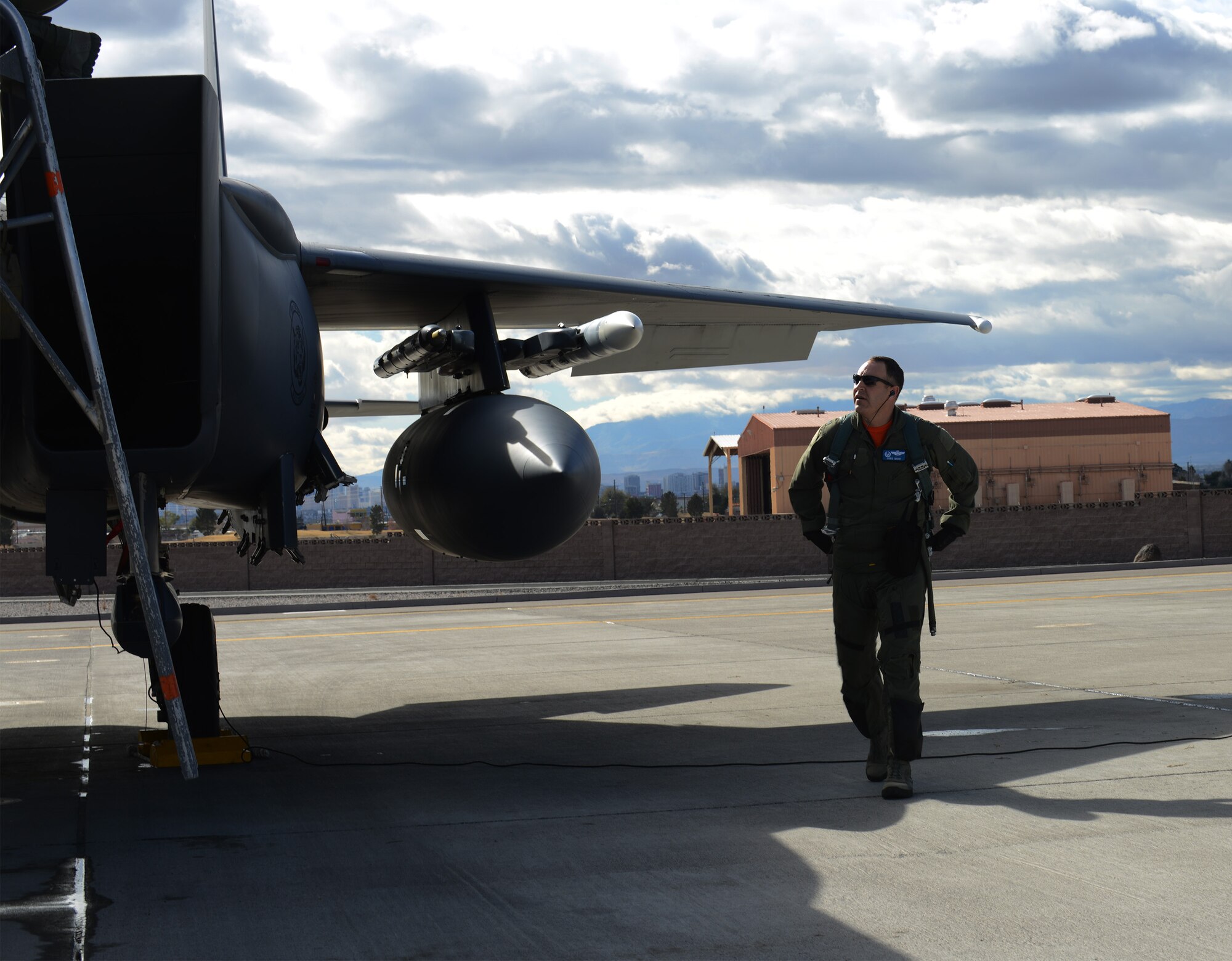 Col. Chris Short, 366th Fighter Wing commander from Mountain Home Air Force Base, Idaho, performs preflight inspections on an F-15E Strike Eagle at Nellis Air Force Base, Nev., Jan. 31, 2014. Short is on temporary duty assignment at Nellis AFB participating in the combat exercise Red Flag 14-1 as the Air Expeditionary Wing commander. The U.S. Air Force’s premier exercise gives military members the opportunity to experience realistic, stressful combat situations in a controlled environment to increase their ability to complete missions and return home. (U.S. Air Force photo by Senior Airman Benjamin Sutton/Released)  