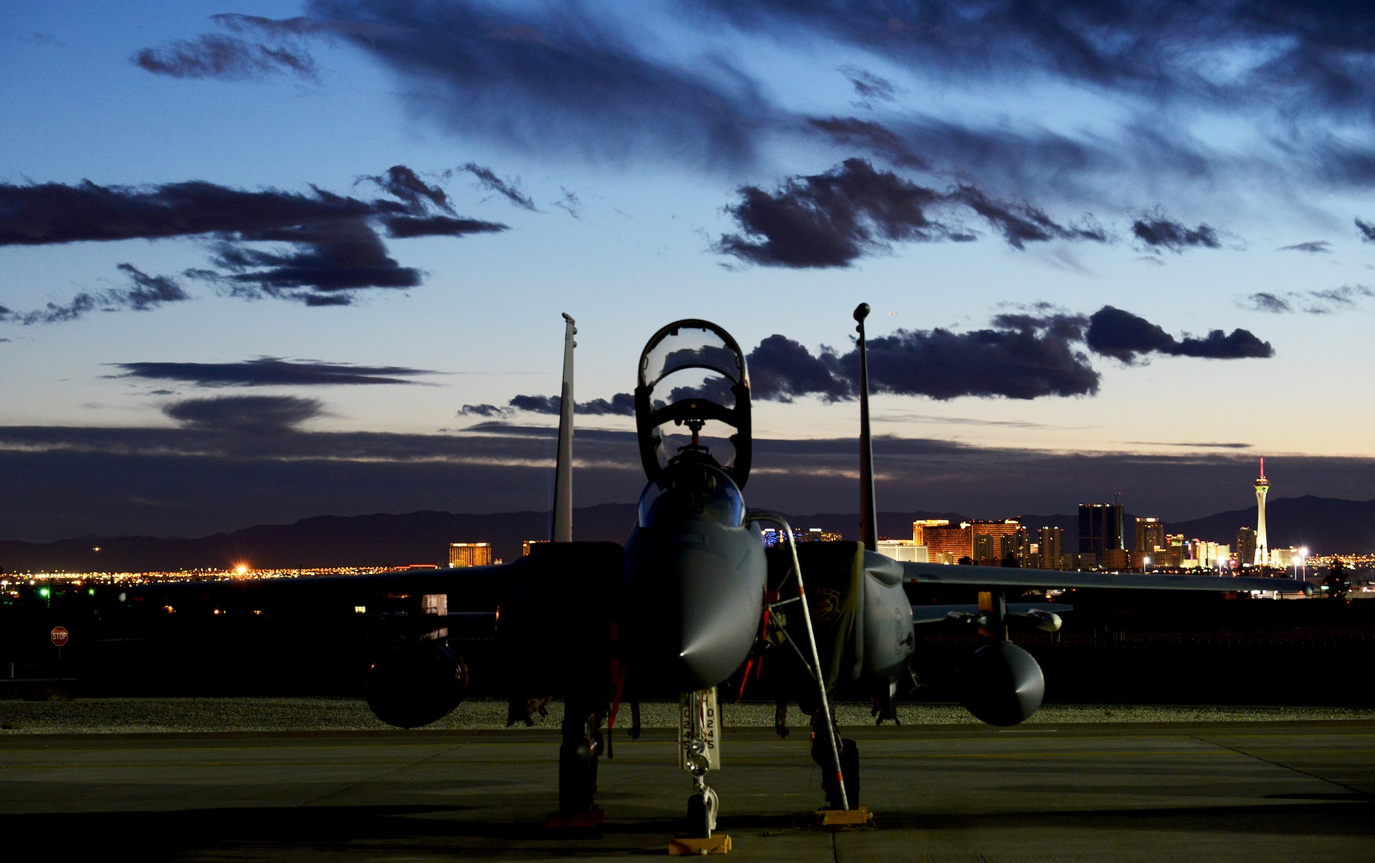 An F-15E Strike Eagle assigned to the 391st Fighter Squadron from Mountain Home Air Force Base, Idaho, sits on the flight line Jan. 31, 2014, at Nellis Air Force Base, Nev. The 391st FS is at Nellis AFB to participate in the premier combat exercise Red Flag 14-1 Jan. 27 to Feb. 14. (U.S. Air Force photo by Senior Airman Benjamin Sutton/Released)    