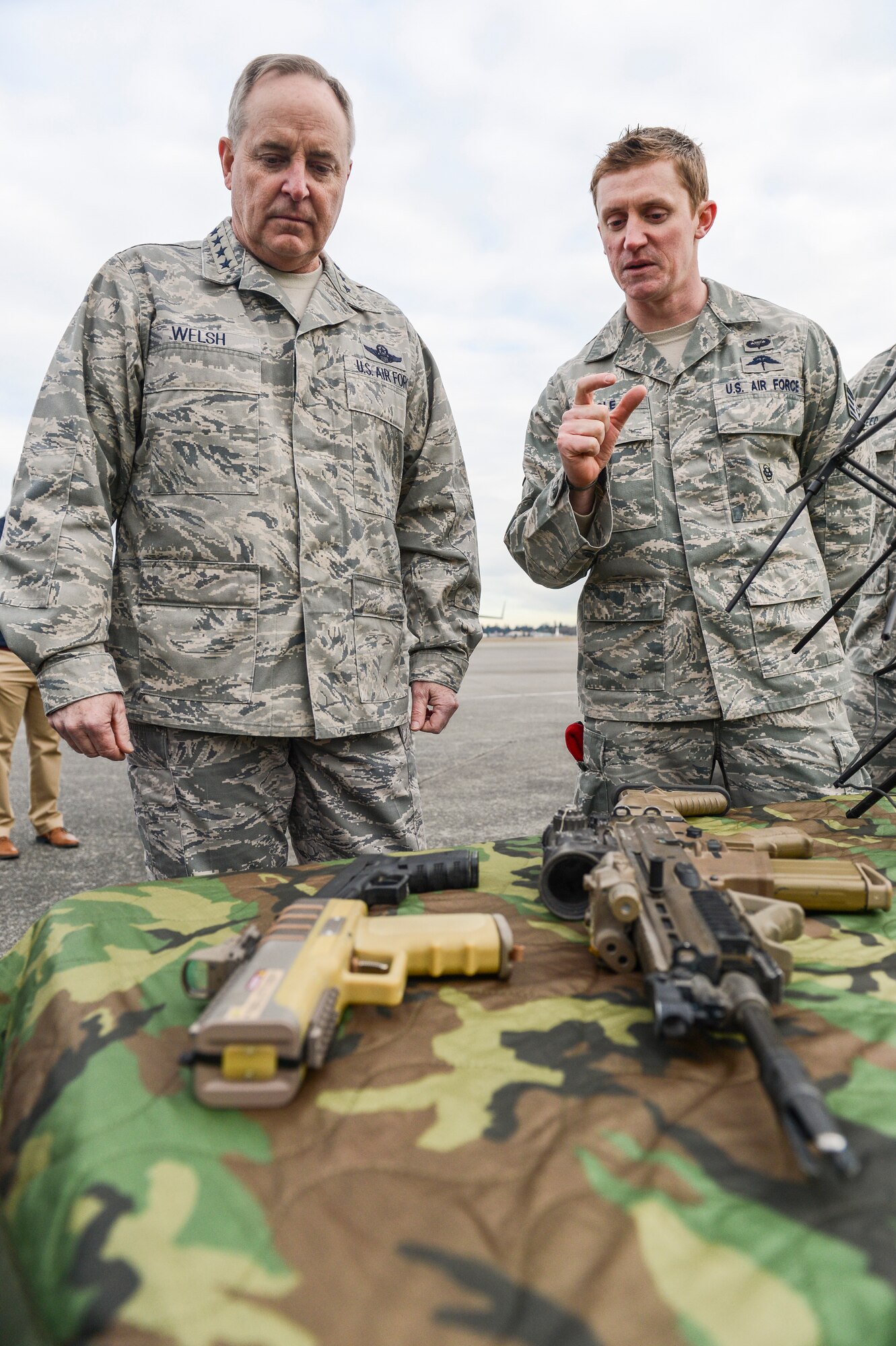Staff Sgt. Nathan Vogle, 22nd Special Tactics Squadron combat controller, briefs Air Force Chief of Staff Gen. Mark A. Welsh III, Feb. 3, 2014, on various weapons and communications equipment used by the 22nd STS, at Joint Base Lewis-McChord, Wash. The 22nd STS is a tenant unit on McChord Field and falls under the Air Force Special Operations Command. (U.S. Air Force photo/Tech. Sgt. Sean Tobin)