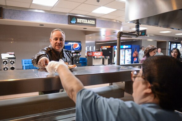 Air Force Chief of Staff Gen. Mark A. Welsh III is served breakfast Feb. 4, 2014, at the Olympic Dining Facility at Joint Base Lewis-McChord, Wash. At the conclusion of their visit to JBLM, Welsh and his wife, Betty, ate breakfast with Airmen and family members and held a Q-and-A with the group. (U.S. Air Force photo/Tech. Sgt. Sean Tobin)