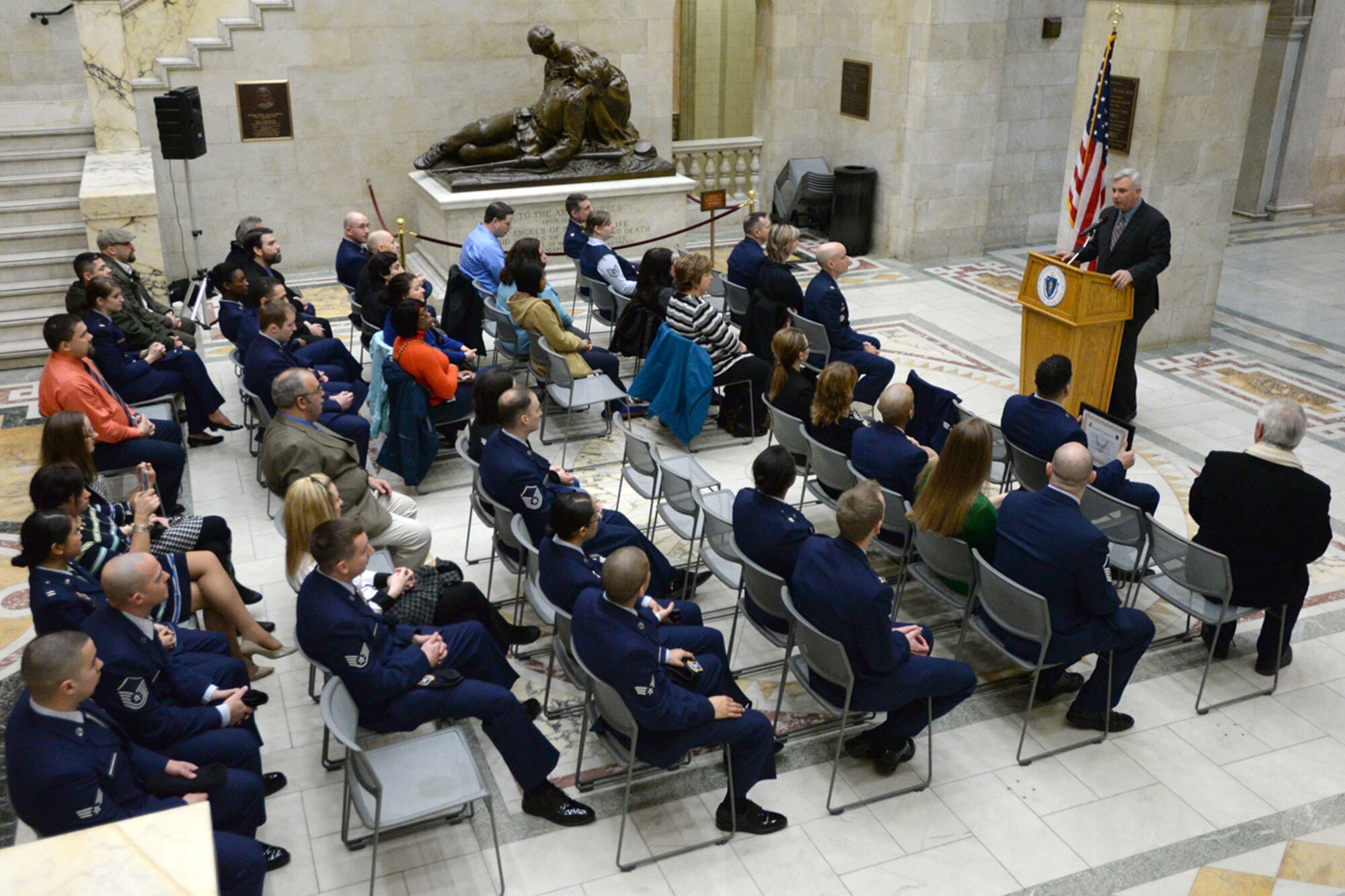 BOSTON, Mass. -- Annual award nominees from the 66th Air Base Group, along with their family and friends, listen as Coleman Nee, Secretary of Veteran's Services, reads a proclamation at the State House, Feb. 3. The nominees enjoyed trips to several Boston-area landmarks over a two day period. Look in next week’s Hansconian for photos of the winners. (U.S. Air Force photo by Mark Herlihy)