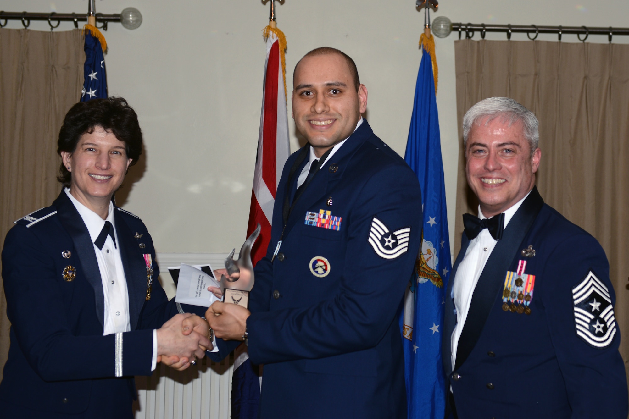 RAF ALCONBURY, United Kingdom - Tech. Sgt. Adrian Estrada, 422nd Medical Squadron, was named the 501st Combat Support Wing's Honor Guard of the Year. Estrada, from El Paso, Texas, oversaw 860 hours of honor guard training and preparing equipment for 35 ceremonies. He also led the team during both the Bicester and Brackley Remembrance Day parades, helping honor World War I and World War II veterans. (U.S. Air Force photo by Tech. Sgt. Chrissy Best)