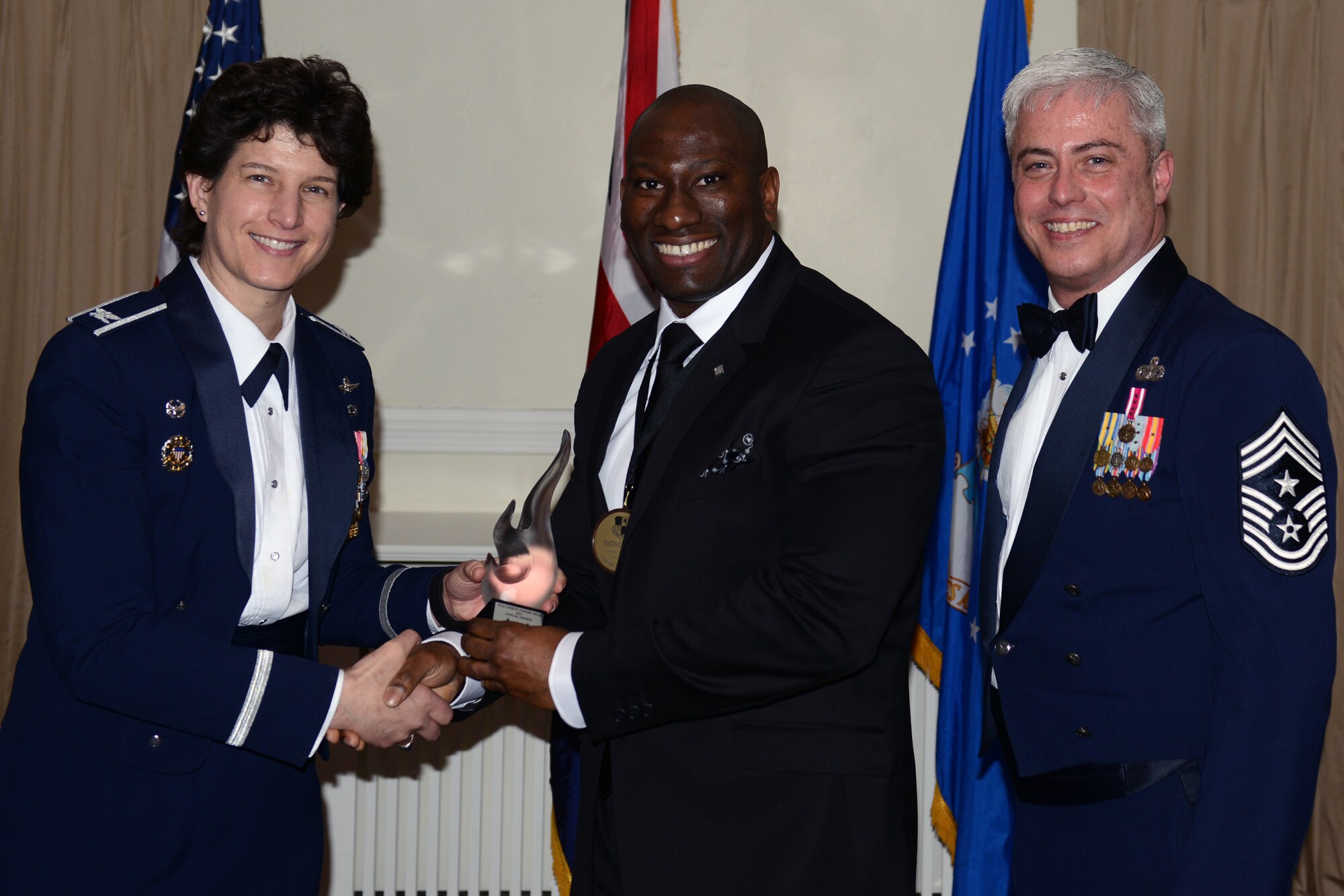 RAF ALCONBURY, United Kingdom - Emmanuel Ine, 423rd Civil Engineer Squadron, was named the 501st Combat Support Wing's Civilian Category II of the Year. Ine spearheaded the demolition of vacant, excess facilities on two installations, meeting 90 percent of the demolition target six years ahead of the 2020 deadline. He also sought out training in design, helping to save $450,000 in design fees. (U.S. Air Force photo by Tech. Sgt. Chrissy Best)