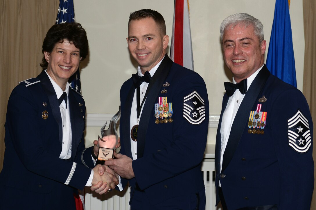 RAF ALCONBURY, United Kingdom - Senior Master Sgt. Dennis Dyke, 421st Air Base Group, was named the 501st Combat Support Wing's First Sergeant of the Year. Dyke, from Lakewood, Ohio, mentored and trained two additional duty first sergeants, creating a job shadow program for training, with one Airman selected to attend the First Sergeant Academy. He also organized night time sobriety checks, leading 14 multi-service senior NCOs from nine agencies to conduct 140 checks that enforced standards and discipline. (U.S. Air Force photo by Tech. Sgt. Chrissy Best)