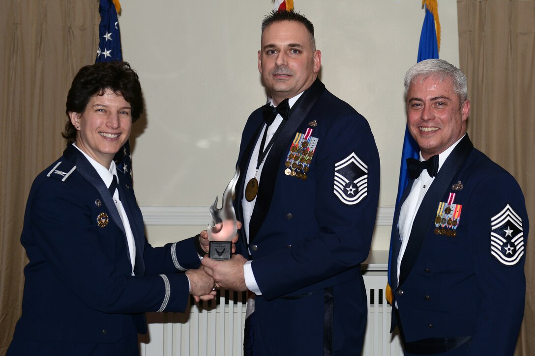 RAF ALCONBURY, United Kingdom - Senior Master Sgt. Nikki Drago, 423rd Security Forces Squadron, was named the 501st Combat Support Wing's Senior NCO of the Year. Drago, from St. Louis, was the key liaison between security forces, local police units and Alconbury school leadership in planning and executing an active shooter exercise. He also guided his Airmen to excellence, as they won two command-level, 13 wing-level and six group-level annual awards. (U.S. Air Force photo by Tech. Sgt. Chrissy Best)