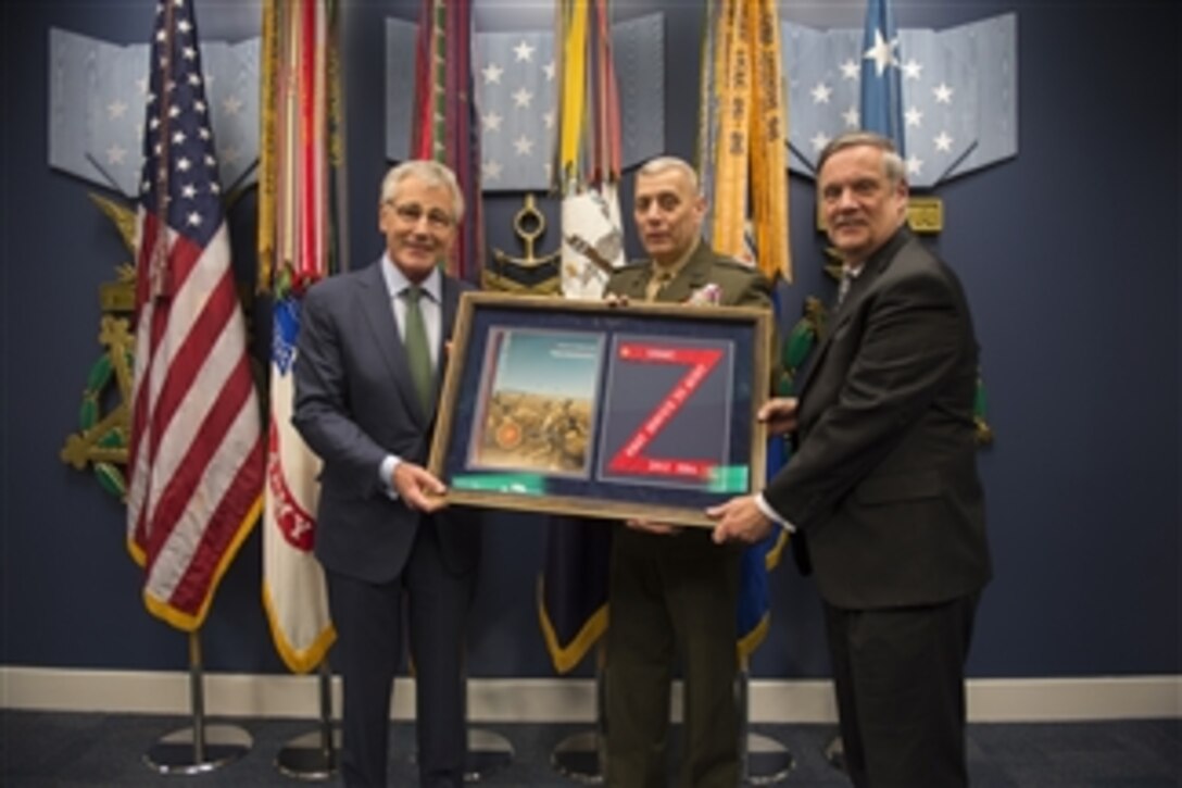 Defense Secretary Chuck Hagel, left, holds a plaque with Marine Gen. John M. Paxton Jr., assistant Marine Corps commandant, and Robert F. Hale, the Pentagon's comptroller, after delivering remarks during a ceremony at the Pentagon's Hall of Heroes, Feb. 6, 2014, to recognize the audit success of the U.S. Marine Corps and Defense Department organizations. 