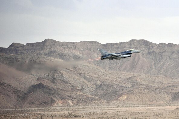 An F-16 Fighting Falcon takes off for a sortie training mission during Red Flag 14-1, Jan. 30, 2014, at Nellis Air Force Base, Nev. Combat units come together from the U.S. and its allied countries to engage in realistic combat training scenarios within Nellis AFB’s 2.9 million acre Test and Training Range Complex. The F-16 is assigned to the 120th Fighter Squadron at Buckley Air Force Base, Colorado Air National Guard. (U.S. Air National Guard photo/Tech. Sgt. Wolfram M. Stumpf)