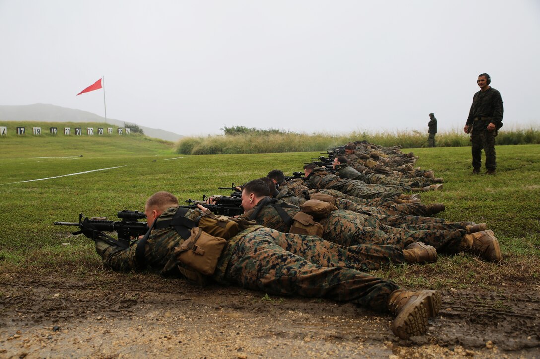 Reconnaissance Marines from 3rd Reconnaissance Battalion, 3rd Marine Division, lie in the prone position while conducting marksmanship training at Kaneohe Bay Range Training Facility, Feb. 4, 2014. (U.S. Marine Corps photo by Lance Cpl. Suzanna Knotts)