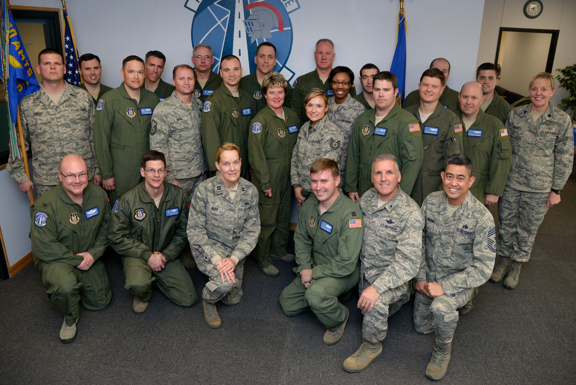 ALTUS AIR FORCE BASE, Okla. – U.S. Air Force members assigned to the 730th Air Mobility Training Squadron pose for a group photo with U.S. Air Force Brig. Gen. John Flournoy Jr., 4th Air Force commander, at the 730th Air Mobility Training Squadron building Feb. 7, 2014 Feb. 7, 2014. The 730th recently moved into the 58th Airlift Squadron through a self-help project, which cost $1,500. (U.S. Air Force photo by Airman 1st Class Klynne Pearl Serrano/Released)