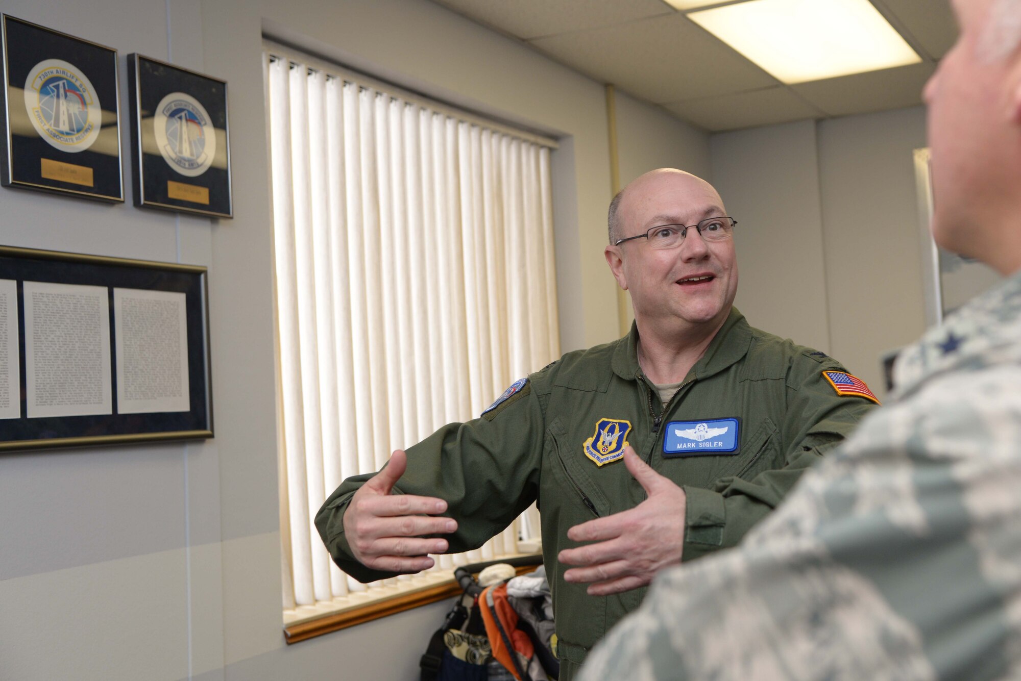 ALTUS AIR FORCE BASE, Okla. – U.S. Air Force Col. Mark Sigler, 452nd Operations Group commander, March Air Reserve Base, Calif., shows U.S. Air Force Brig. Gen. John Flournoy Jr., 4th Air Force commander, around the new 730th Air Mobility Training Squadron Feb. 7, 2014. The 730th recently moved into the 58th Airlift Squadron through a self-help project, which cost $1,500. (U.S. Air Force photo by Airman 1st Class Klynne Pearl Serrano/Released)