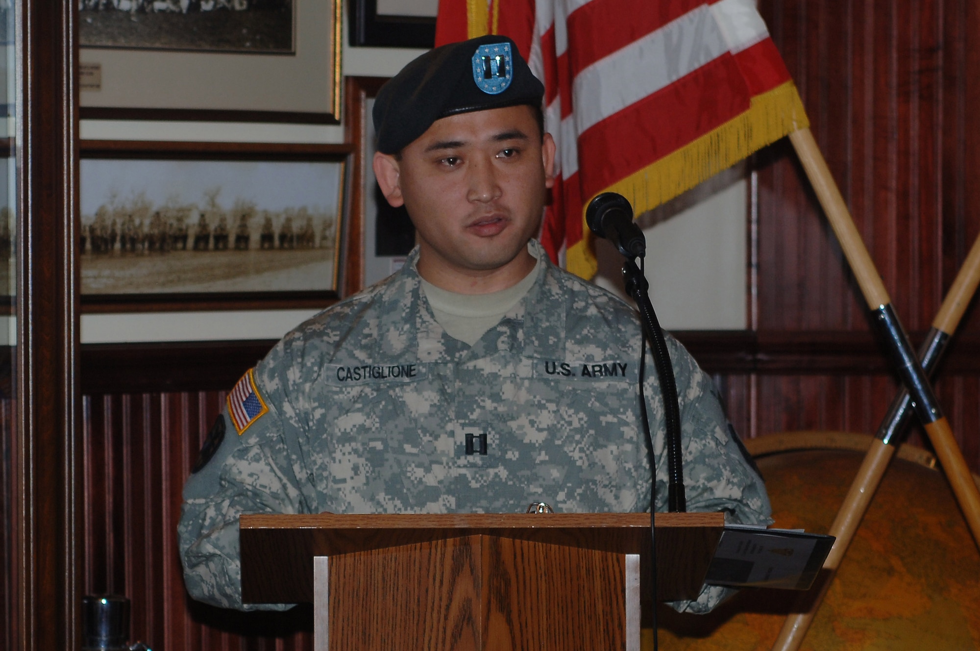 U.S. Army Capt. Matthew Castiglione, 382nd Transportation Theater Opening Element, Special Troops Battalion, 7th Transportation Brigade (Expeditionary) commander, speaks during an inactivation ceremony at Fort Eustis, Va., Feb. 6, 2014. While many 382nd TTOE Soldiers and their families will be assigned to various units around the world, many will take on new roles at Fort Eustis. (U.S. Air Force photo by Senior Airman Teresa Aber/Released)