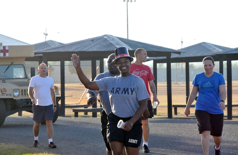Joint Task Force-Bravo members participate in the 2014 Groundhog Day with 5k fun run/walk at Soto Cano Air Base, Honduras, Feb. 07, 2014. Top hats and Groundhog Day themed headpieces were handed out. The race was organized by the Army Support Activity's (ASA) Department of Family Morale Welfare and Recreation. (Photo by Ana Fonseca)  