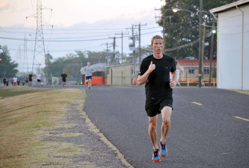 Joint Task Force-Bravo members participate in the 2014 Groundhog Day with 5k fun run/walk at Soto Cano Air Base, Honduras, Feb. 07, 2014. Top hats and Groundhog Day themed headpieces were handed out. The race was organized by the Army Support Activity's (ASA) Department of Family Morale Welfare and Recreation. (Photo by Ana Fonseca) 