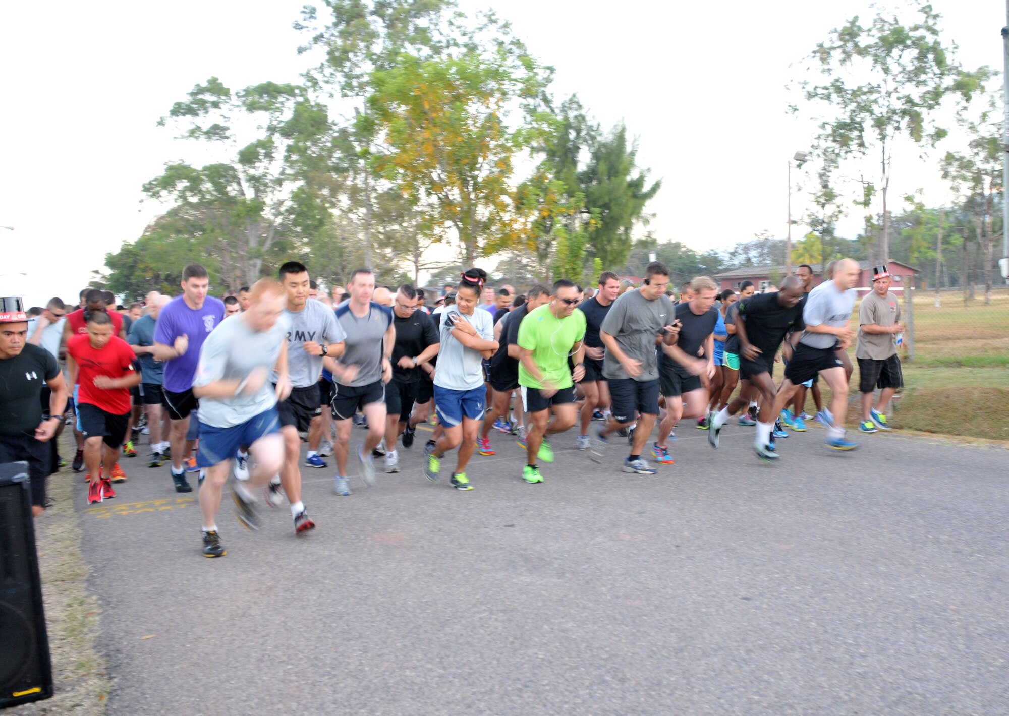 Joint Task Force-Bravo members participate in the 2014 Groundhog Day with 5k fun run/walk at Soto Cano Air Base, Honduras, Feb. 07, 2014. Top hats and Groundhog Day themed headpieces were handed out. The race was organized by the Army Support Activity's (ASA) Department of Family Morale Welfare and Recreation. (Photo by Ana Fonseca) 