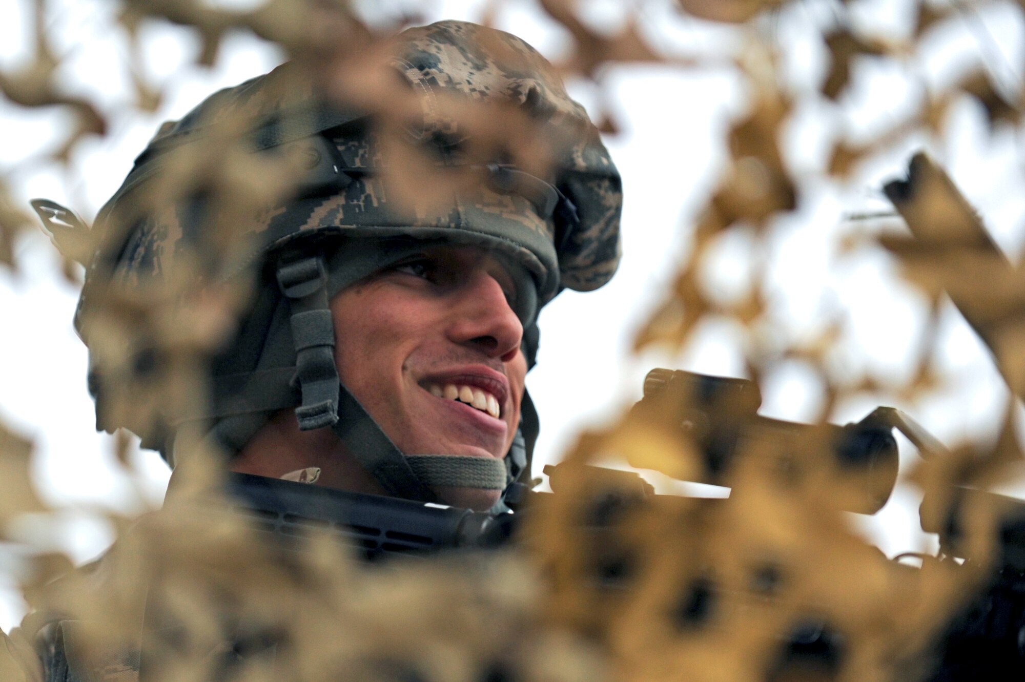 Airman 1st Class Cameron Lane, 4th Security Forces Squadron patrolman, guards a simulated deployed location during Employment Exercise Coronet Warrior 14-01, Feb. 4, 2014, at Seymour Johnson Air Force Base, N.C. The exercise ensures Airmen are prepared to support overseas contingency operations and effectively complete the mission of the 4th Fighter Wing. (U.S. Air Force photo by Airman 1st Class Aaron J. Jenne)