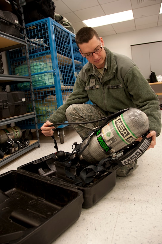 Senior Airman Casey Mowatt, 82nd Medical Group bioenvironmental technician, demonstrates how the hazardous material identification system scans and identifies the presence of potential hazardous materials during biomedical science corps appreciation week Jan. 27-30, 2014. Bioenvironmental engineering is one of the 17 different specialties that are part of the bio medical science corps. (U.S. Air Force photo by Airman 1st Class Robert L. McIlrath)