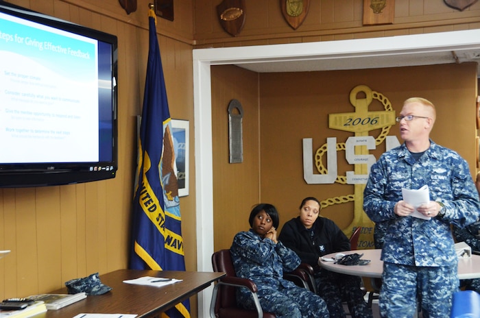 Petty Officer 1st Class John Furr, Naval Health Clinic Charleston Military Medicine leading petty officer, conducts a mentorship briefing for fellow first class petty officers at the LowCountry Chief Petty Officer’s Association, Feb. 6, 2014, at Joint Base Charleston – Weapons Station. Furr’s briefing is part of CPO 365, a year-round training initiative that prepares all first class petty officers (E-6) to become chiefs (E-7). (U.S. Navy photo/Eric Sesit)