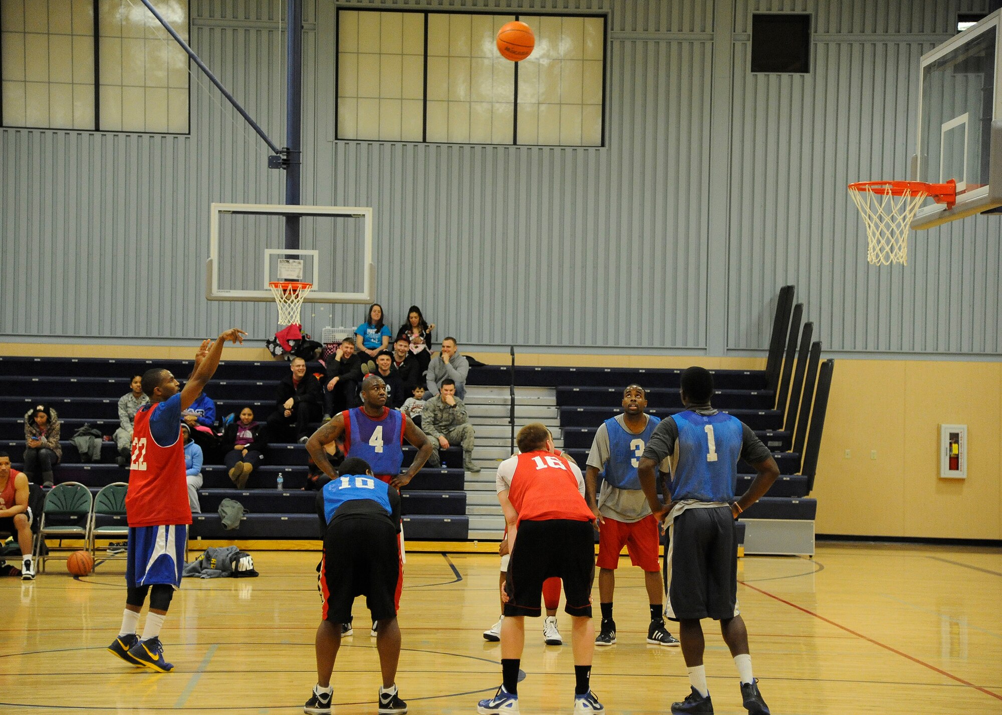 A member of the red 741st Missile Security Forces Squadron team shoots a free-throw after being fouled during the 2013 intramural basketball season championship game Feb. 3. The 741st MSFS team went undefeated this season and has lost only one game in the past three years. (U.S. Air Force photo/Airman 1st Class Collin Schmidt)