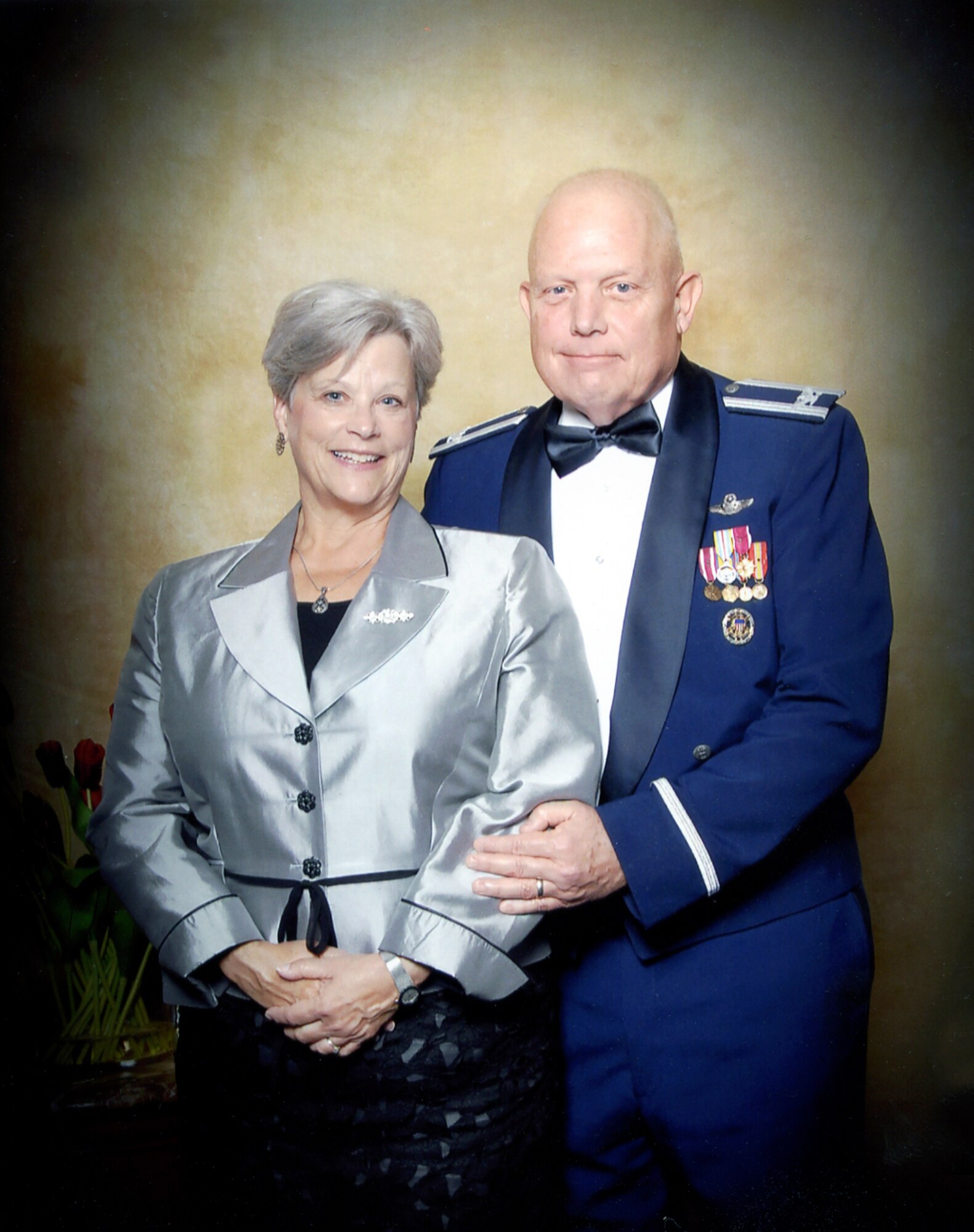 Air Force Retired Colonel Larry Bickel and Christy Bickel, director of Ceremonies and Protocol for the Air Force District of Washington, are photographed together at Bolling Air Force Base almost 40 years after their wedding. (Courtesy photo)