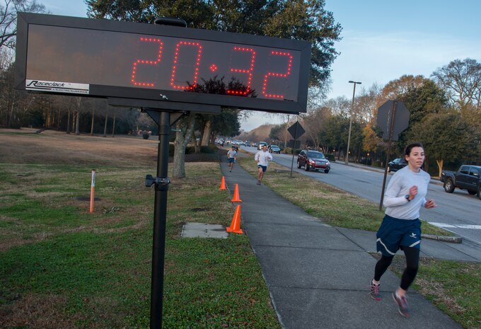 1st Lt. Lyndsey Horn, 1st Combat Camera Squadron, pushes to the finish line during the Commander’s Challenge 5K Run Feb. 7, 2014, on Joint Base Charleston – Air Base, S.C. The Commander’s Challenge is held monthly to test Team Charleston’s fitness abilities. Horn was the top female runner with a time of 20:33. (U.S. Air Force photo/ Airman 1st Class Clayton Cupit)