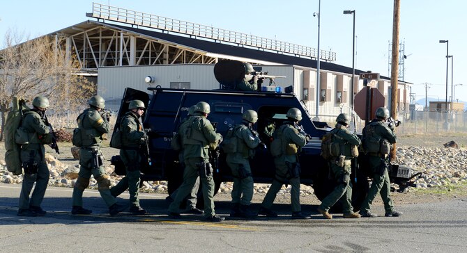 A Yuba County SWAT team participates in an active shooter exercise at Beale Air Force Base, Calif., Feb. 5, 2014. More than 20 base and local agencies participated in the exercise.  (U.S. Air Force photo by John Schwab/Released)